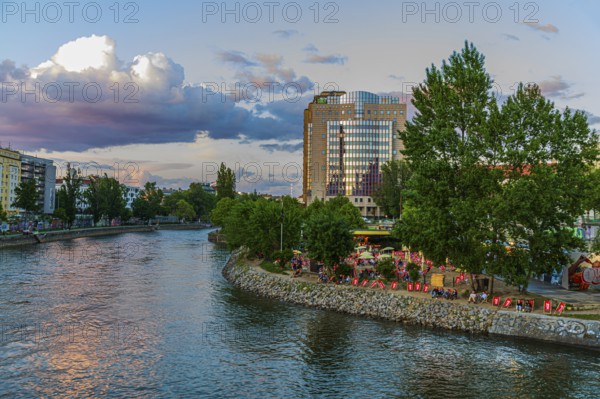 Herrmann beach bar on the Danube Canal in the evening sun, near the Urania observatory, Vienna,