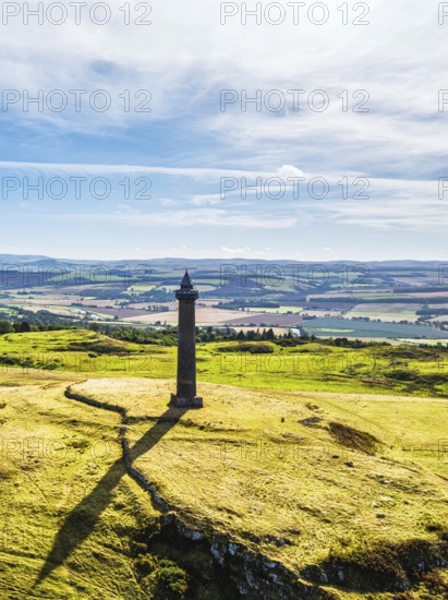Waterloo Monument over Scottish fields and farms from a drone, Jedburgh, Scotland, UK
