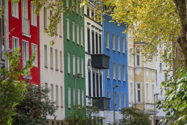 Residential buildings in Düsseldorf-Bilk, facades with different colors, rental apartments, past,