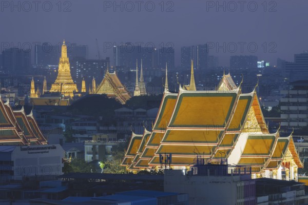 Panorama from Golden Mount to illuminated Wat Ratchabophit, Wat Rachapradit, Wat Pho and Wat Arun,