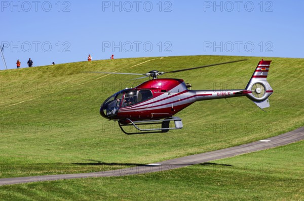 A Eurocopter EC 120B Colibri helicopter, D-HALX registration, during a flight demonstration as part
