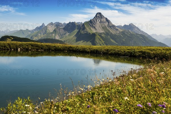 Mountain landscape and picturesque little lake, Saloberkopf, Warth, Bregenzerwald, Vorarlberg,