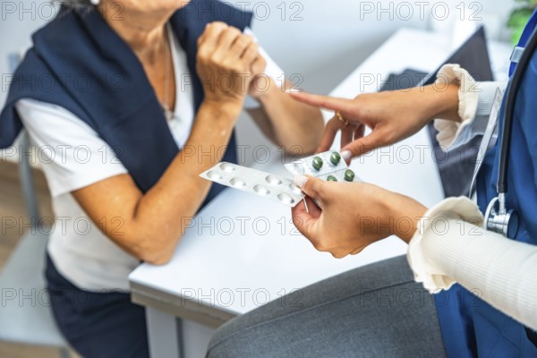 Healthcare professional explaining prescribed medication to an elder patient, discussing dosage and