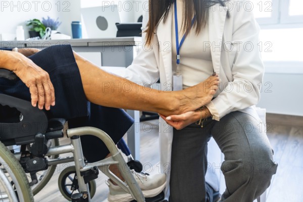 Healthcare professional wearing a lab coat and examining the leg of a senior patient sitting in a