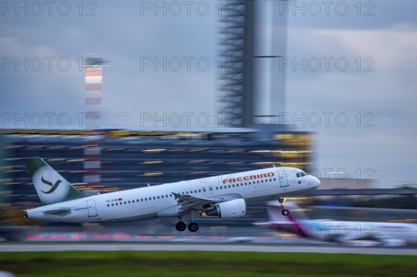 Freebird Airbus A320, taking off from Düsseldorf Airport, Air Traffic Control Tower, North