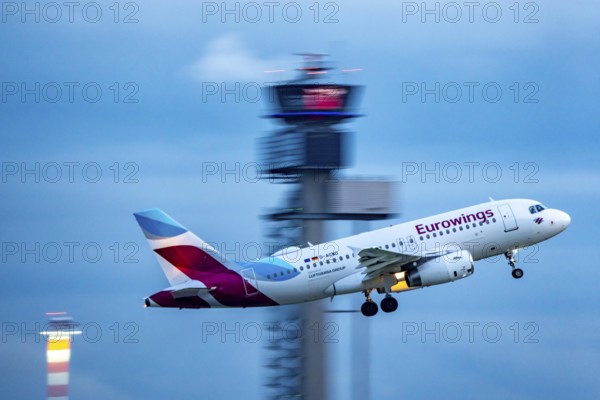 Eurowings Airbus A319 taking off from Düsseldorf Airport, Air Traffic Control Tower, North