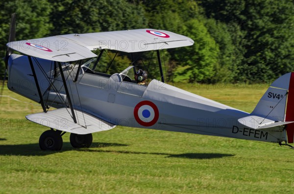 A double-decker Stampe-Vertongen SV-4B with registration D-EFEM during a flight demonstration as