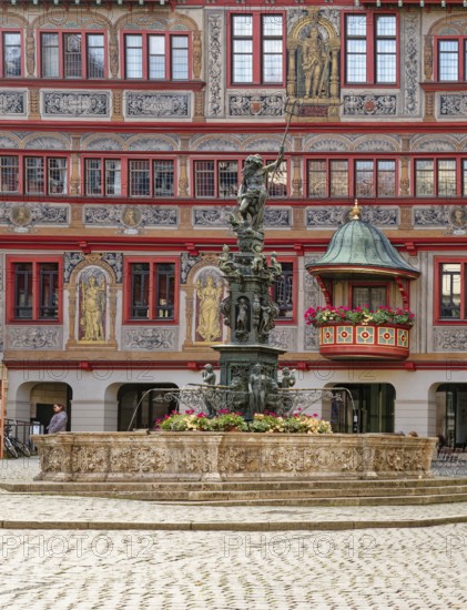 Market square with town hall and Neptune fountain with Neptune and trident from the Renaissance,