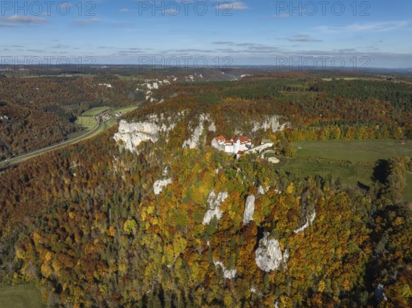 Aerial view of Wildenstein Castle near Leibertingen, surrounded by autumn vegetation, Upper Danube