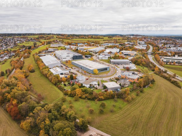 Bird's eye view of industrial buildings and fields in autumn weather, Dornstetten, Freudenstadt