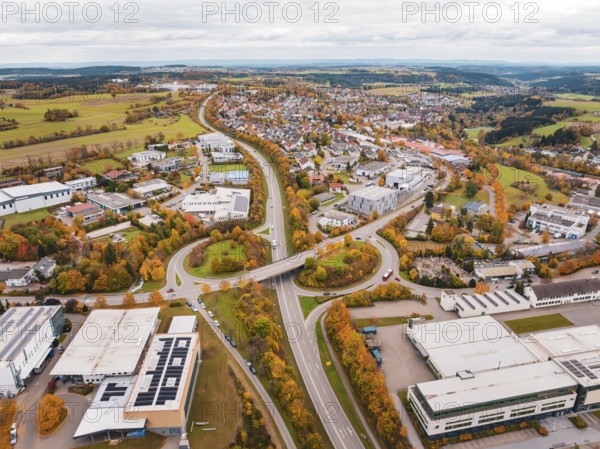 City panorama with street and buildings in autumn colors seen from a bird's eye view, Dornstetten,