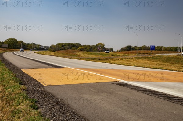 Blue Earth, Minnesota - A 'Golden Stripe' of yellow pavement marks the spot where Interstate 90 was