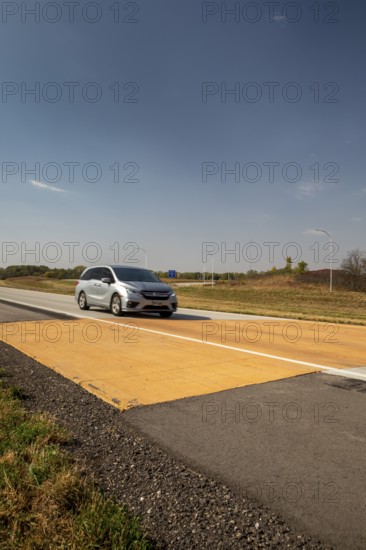 Blue Earth, Minnesota - A 'Golden Stripe' of yellow pavement marks the spot where Interstate 90 was