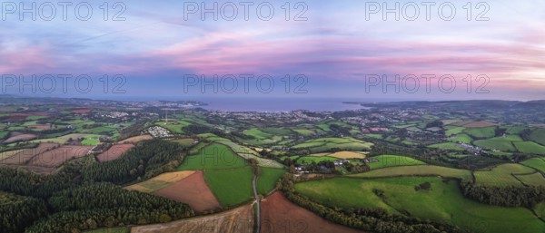 Twilight Sky of Torbay farms and fields from a drone, Totnes, Berry Pomeroy, Devon, England, United