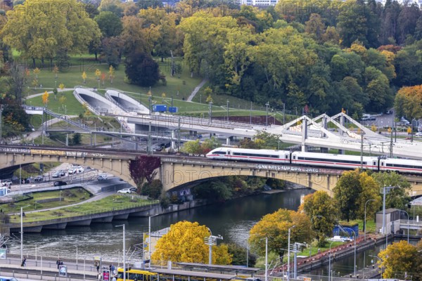 Bridges across the Neckar in Bad Cannstatt with Rosenstein Park. The ICE is still running on the
