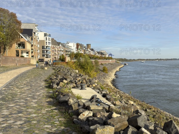 View of Rhine promenade from Emmerich right in front of it against waves and slight low floods