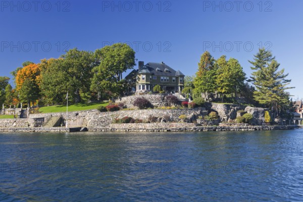 House on a small island in the Saint Lawrence River, 1000 Islands Park, on the borderline the
