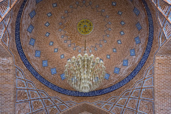 Magnificent dome with geometric patterns and central chandelier in a mosque, Blue Mosque, Shiite