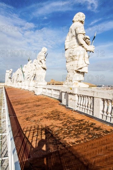 Apostle statues on the roof of Basilica of Saint Peter. Vatican City, Vatican City State. 27.12