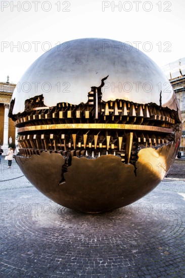 Sphere within Sphere (Esfera con Esfera), sculpture made by Arnaldo Pomodoro at Belvedere Courtyard