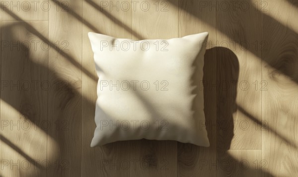 A beige pillow on a wooden floor with sunlight casting intricate shadows. AI generated