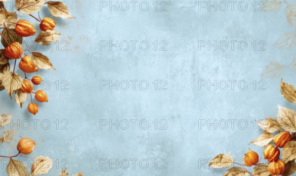 A blue background with orange leaves and fruits. The background is blue and the leaves and fruits