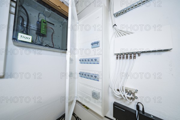 Open electrical distributor in bright technical room, house renovation, air conditioning