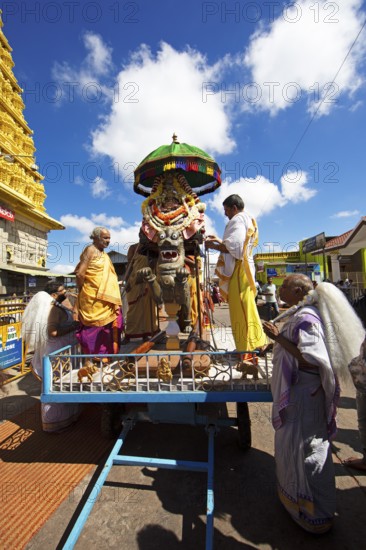 Puja at the Chamundeswar Hindu Temple on Chamundi Hill, Hindu monks prepare the chariot with the