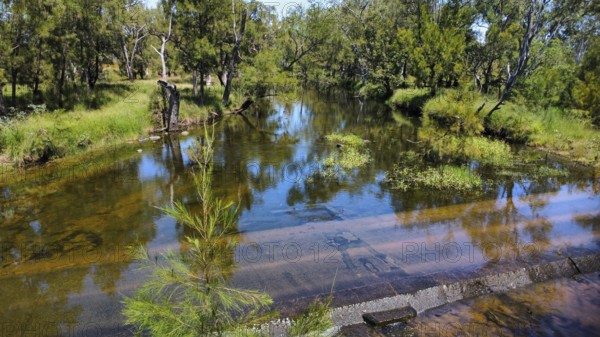 A flooded street at the end of the rainy season in the Northern Territory, Australia, photograped
