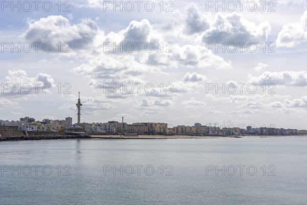 An old historic town. The skyline along the city beach and promenade shows its former glory. Cadiz
