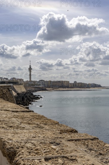An old historic town. The skyline along the city beach and promenade shows its former glory. Cadiz