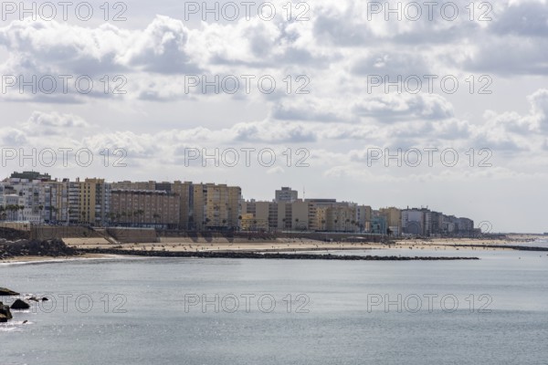 An old historic town. The skyline along the city beach and promenade shows its former glory. Cadiz