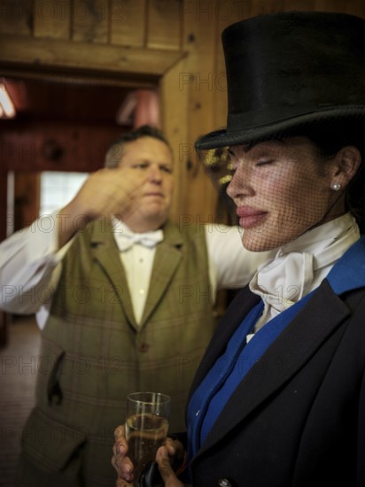 Members of the Toronto North York Hunt Club, dressed in traditional hunting clothes, prepare ahead