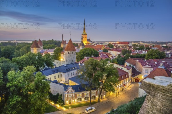 Evening city panorama, city towers, city walls, St. Olaf's Church in the back, view of the old