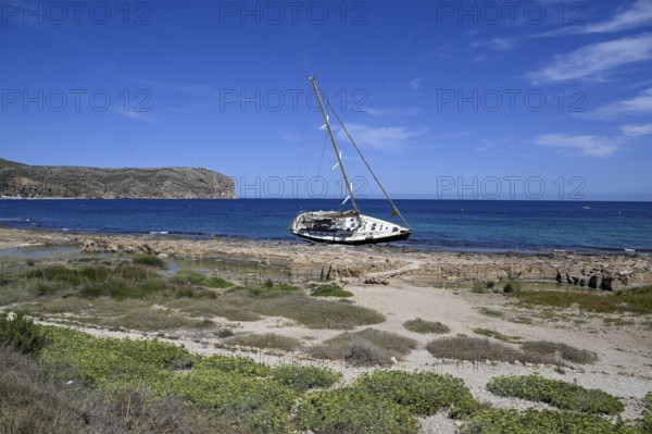 Stranded sailing yacht, storm, severe weather, Jávea or Xàbia, Alicante Province, Comunidad