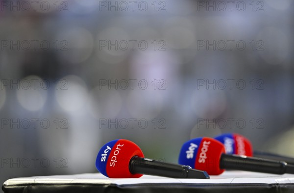 Detailed view, SKY logo microphones lying on presentation table, German Classico, FC Bayern Munich