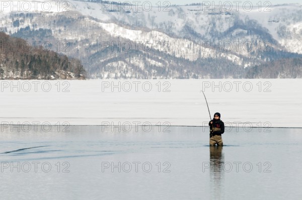 Japan, Hokkaido, Fisherman in winter Fisherman, winter, Frozen lake, Hokkaido, North, East, Winter,