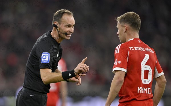 Referee Bastian Dankert talking with Joshua Kimmich FC Bayern Munich FCB (06) gesture gesture