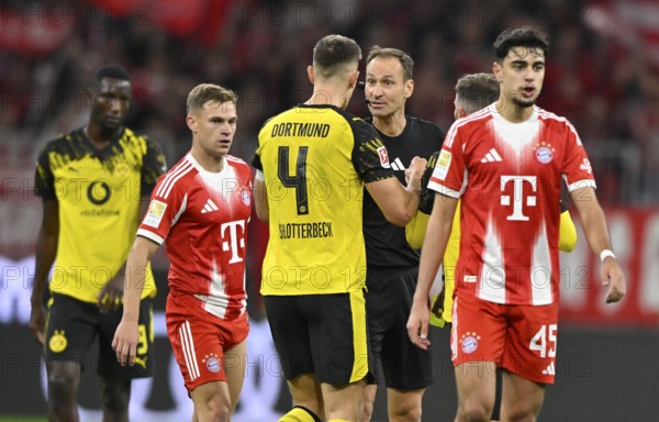 Referee Bastian Dankert talking to Nico Schlotterbeck Borussia Dortmund BVB (04) Joshua Kimmich FC