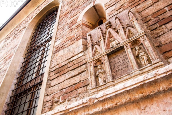 Medieval building facade in the historic center of Verona. Verona, Province of Verona, Italy. 10.12
