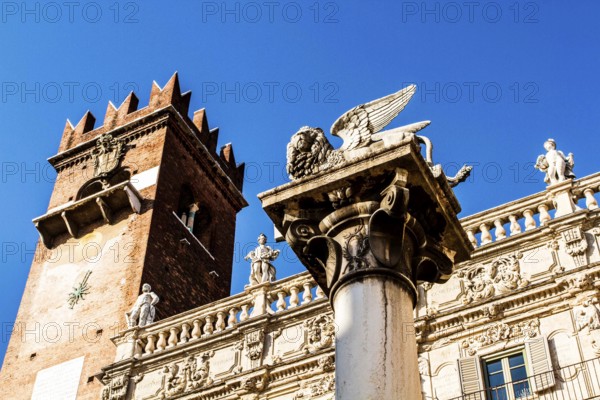 Column with the Lion of Saint Mark and Palazzo Maffei in the backgound at Piazza delle Erbe.