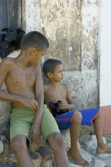 Boy Holding Monkey, Alcântara, Maranhão, Brazil