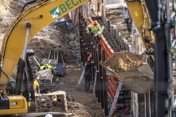 Construction site, dismantling, demolition of a large building, construction of retaining walls in