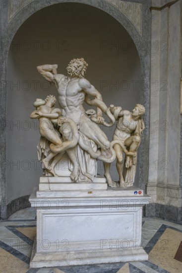 Photo of original ancient marble sculpture Laocoon group of priests Laocoon and his sons fighting