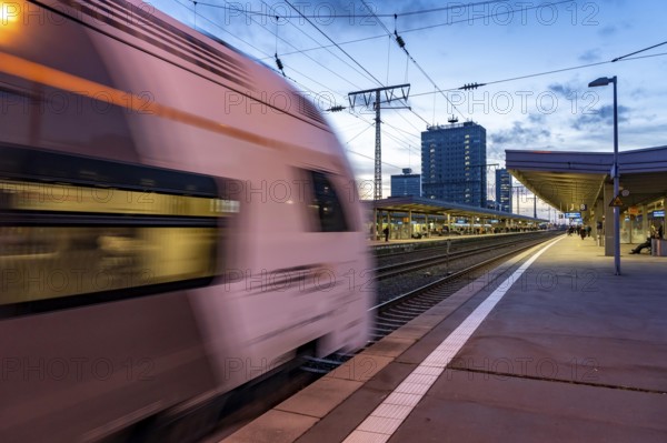 RRX, Rhein-Ruhr-Express, in Essen main station, passengers on the platform, North Rhine-Westphalia,