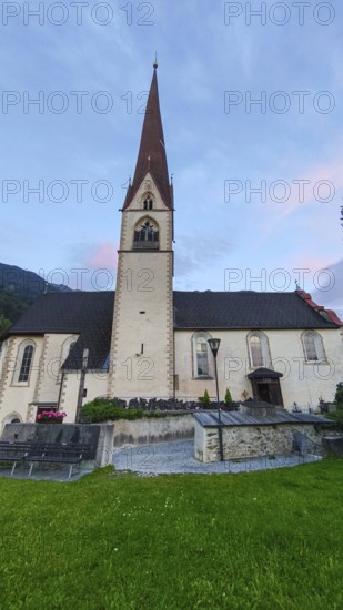 Late Gothic Catholic parish church of Saints George and Nicholas from around 1500 with churchyard,