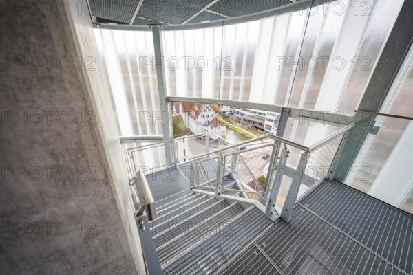 Staircase inside a building with a view of the city and roof landscape, ZOB Calw, Hermann