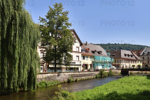 Ettlingen, Germany - August 13th 2025: Alb brook in historic center of Ettlingen, Germany. Small
