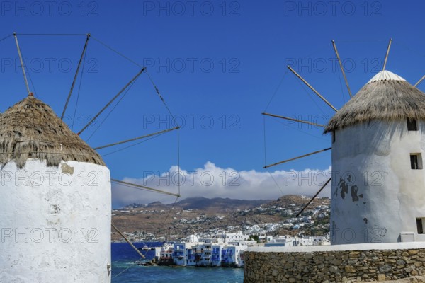 Mykonos, Cyclades, Greece - The six sixteenth-century windmills, lined up on a hill above Mykonos