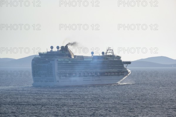 Mykonos, Cyclades, Greece - Cruise ship AZURA from the shipping company P&O Cruises sails out of
